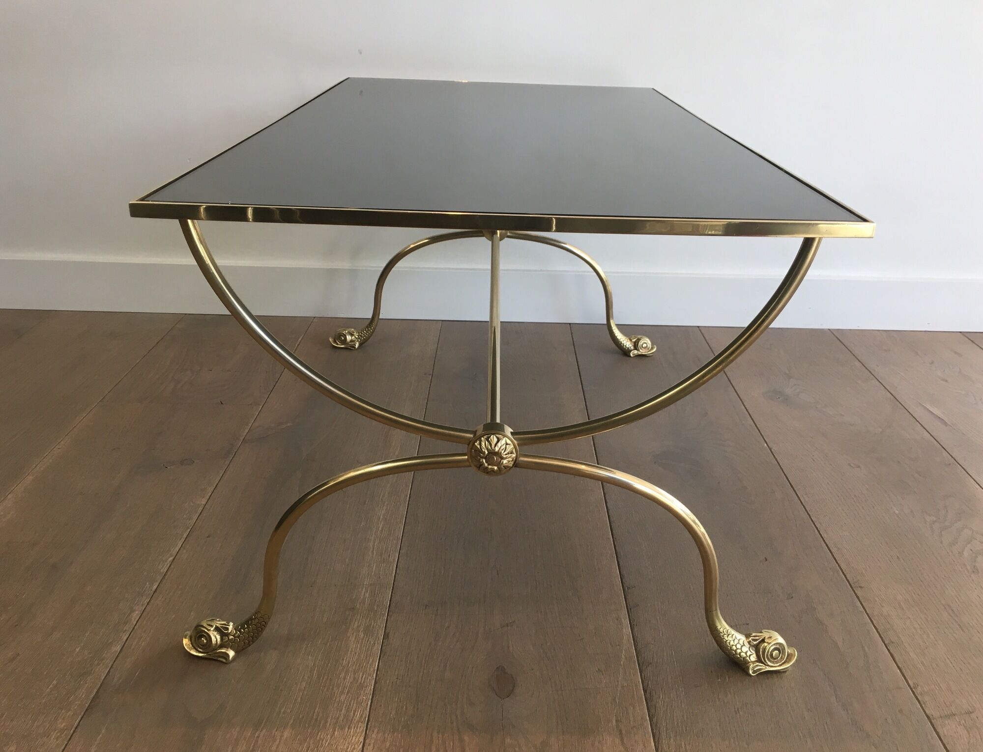 Neoclassical brass style coffee table with dolphin head decoration