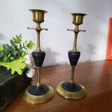 Pair of brass and black hard stone candlesticks