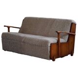 Modern Swedish two-seater independent sofa bed in pine and lambswool, 1950s.