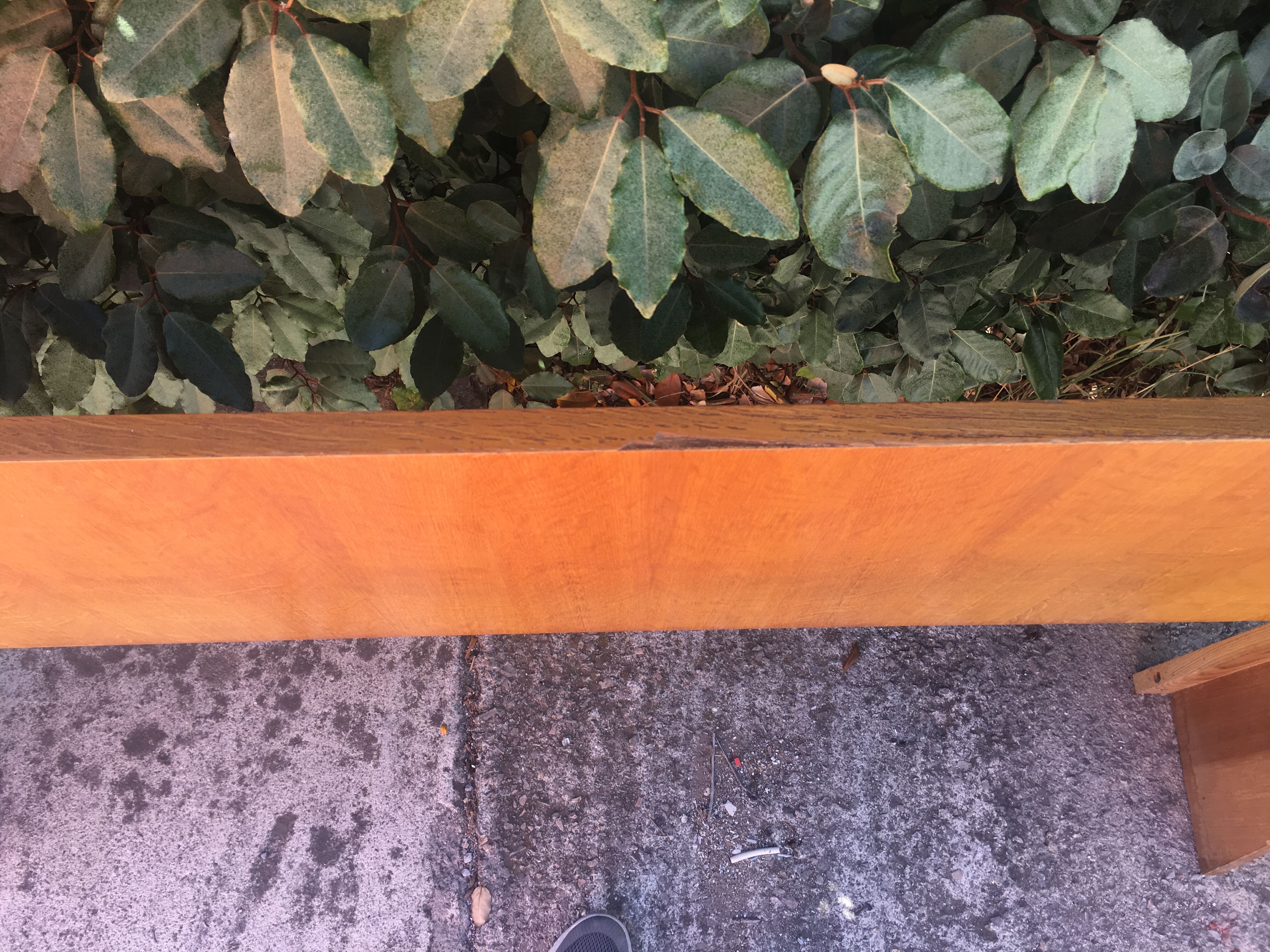 Vintage headboard with hanging bedside tables