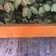 Vintage headboard with hanging bedside tables