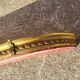 Old bed canopy in yellow copper and bronze