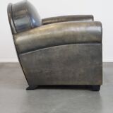 Sheepskin design armchair in a beautiful deep dark color