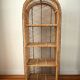 Rattan shelf on legs circa 1960