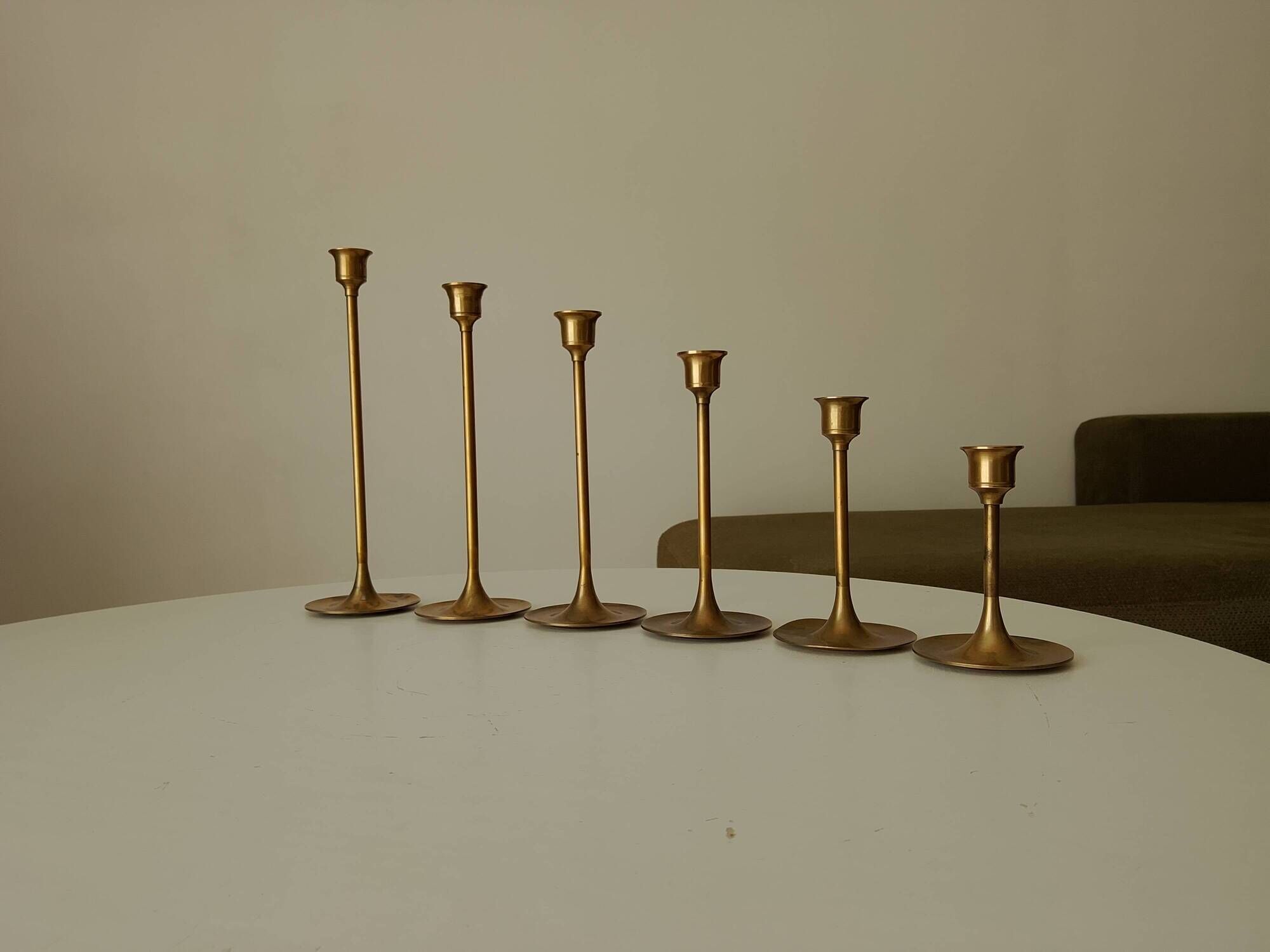 Set of 6 Scandinavian brass candle holders from the 1960s.