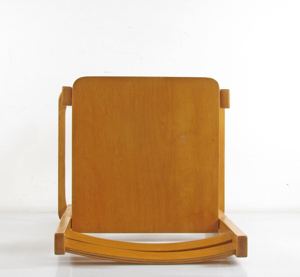 Children's chair in plywood in Scandinavian Danish style.