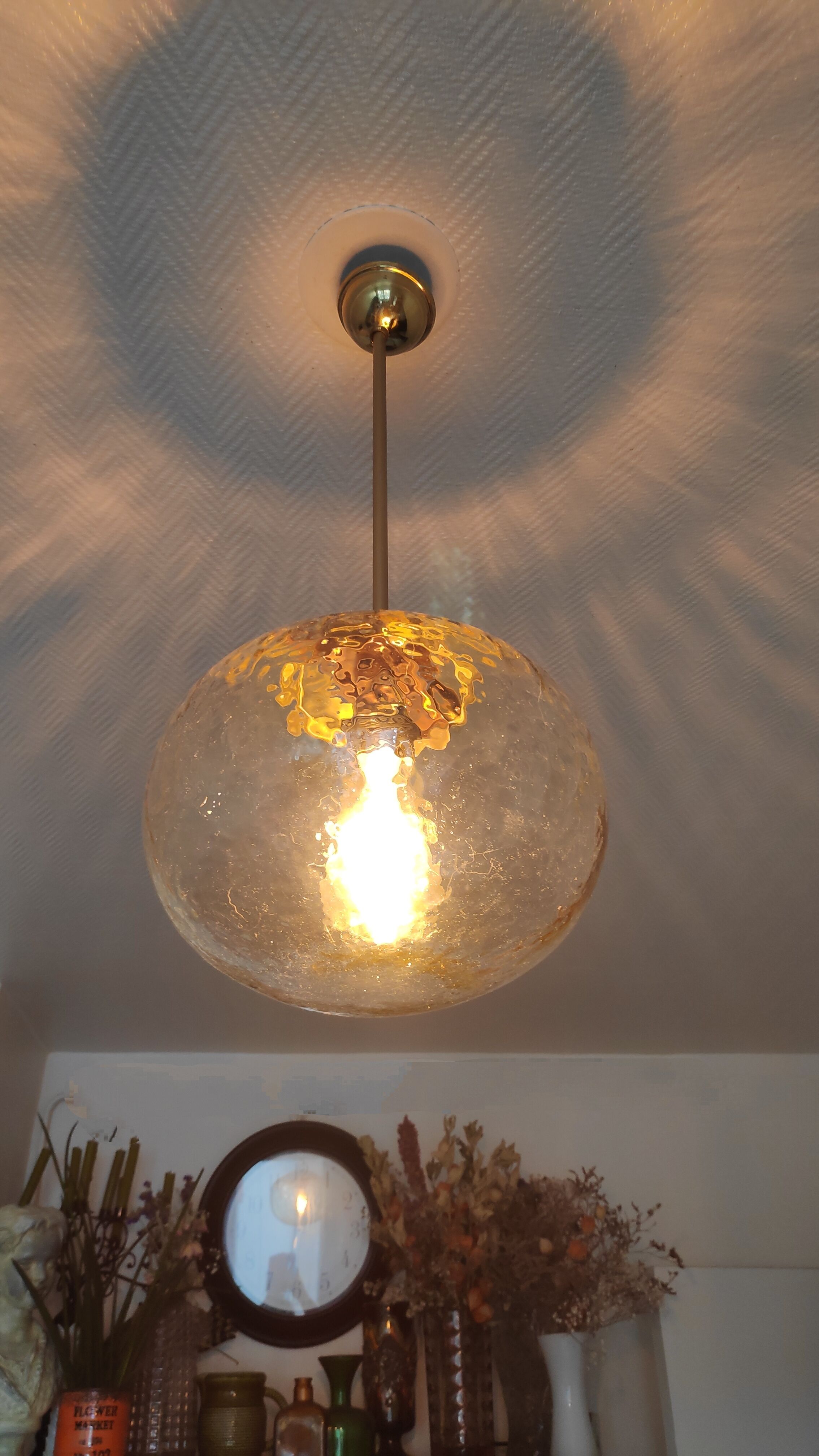 Vintage suspension globe in amber glass