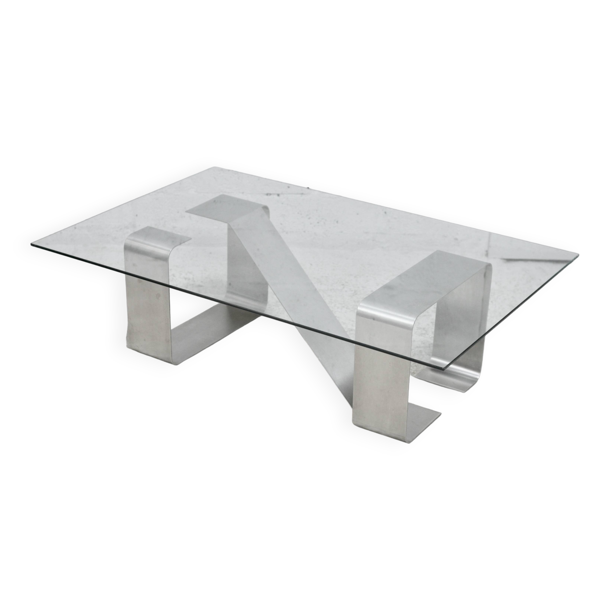 Coffee table with "kinetic" steel base and glass slab. Circa 1970.
