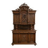 Important two-body buffet in solid walnut, richly carved in pure Renaissance style.
