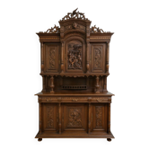 Important two-body buffet in solid walnut, richly carved in pure Renaissance style.