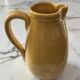 Glazed terracotta jug