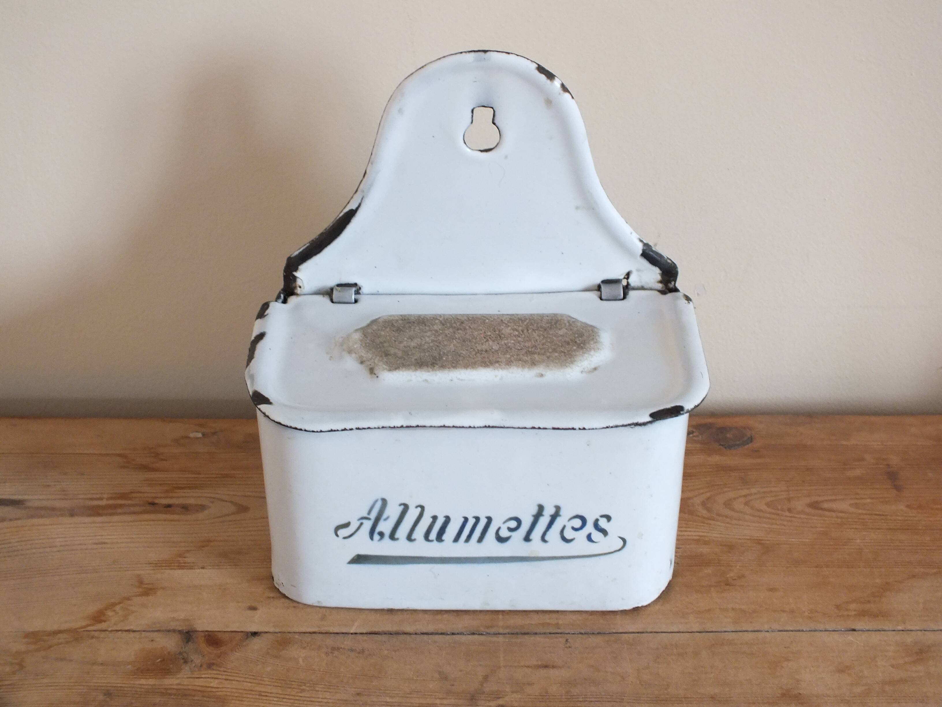 old matchbox in enameled sheet metal