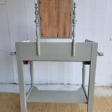 Antique wooden dressing table with marble top and mirror.