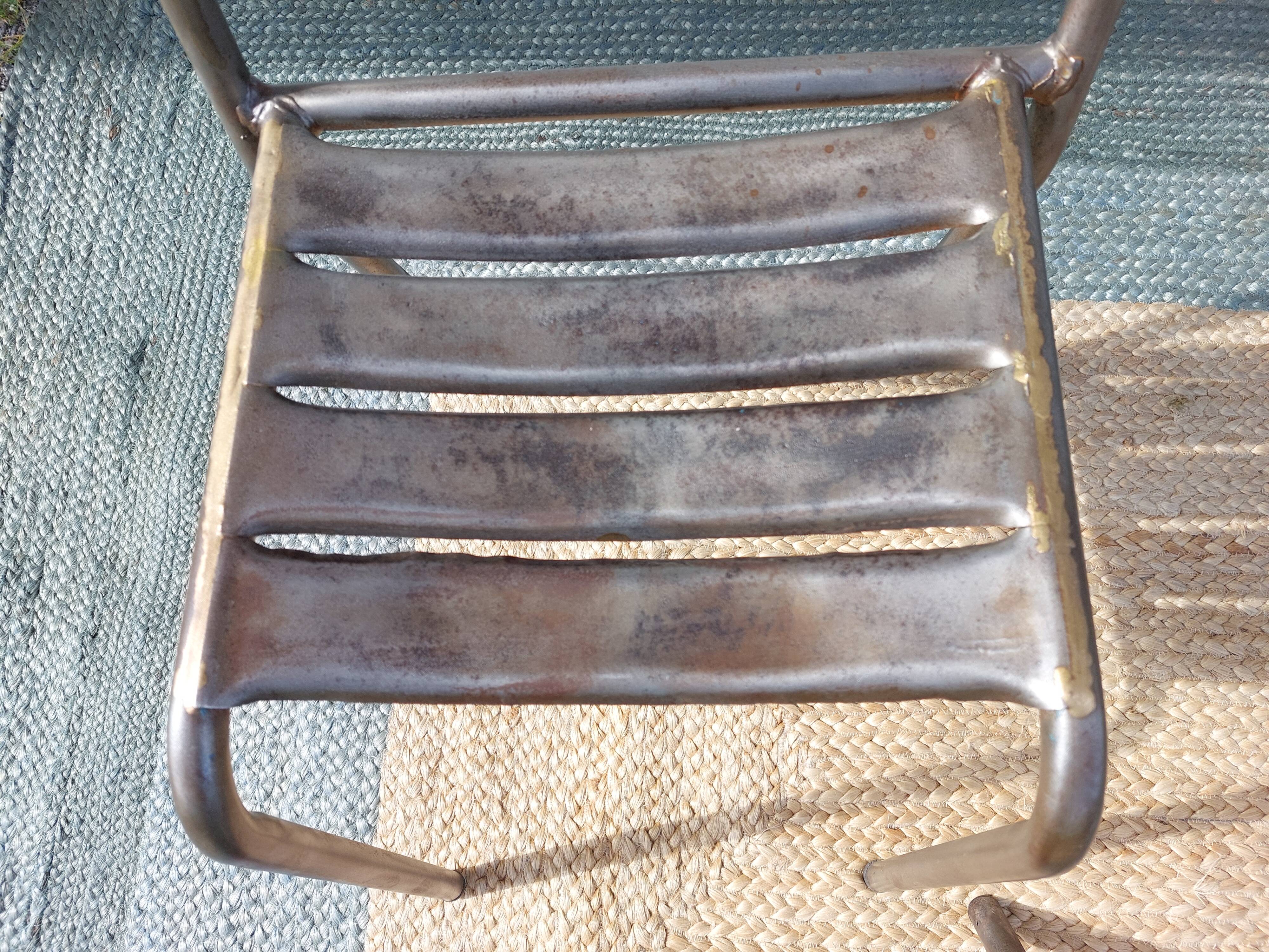 3 metal chairs, Tolix style