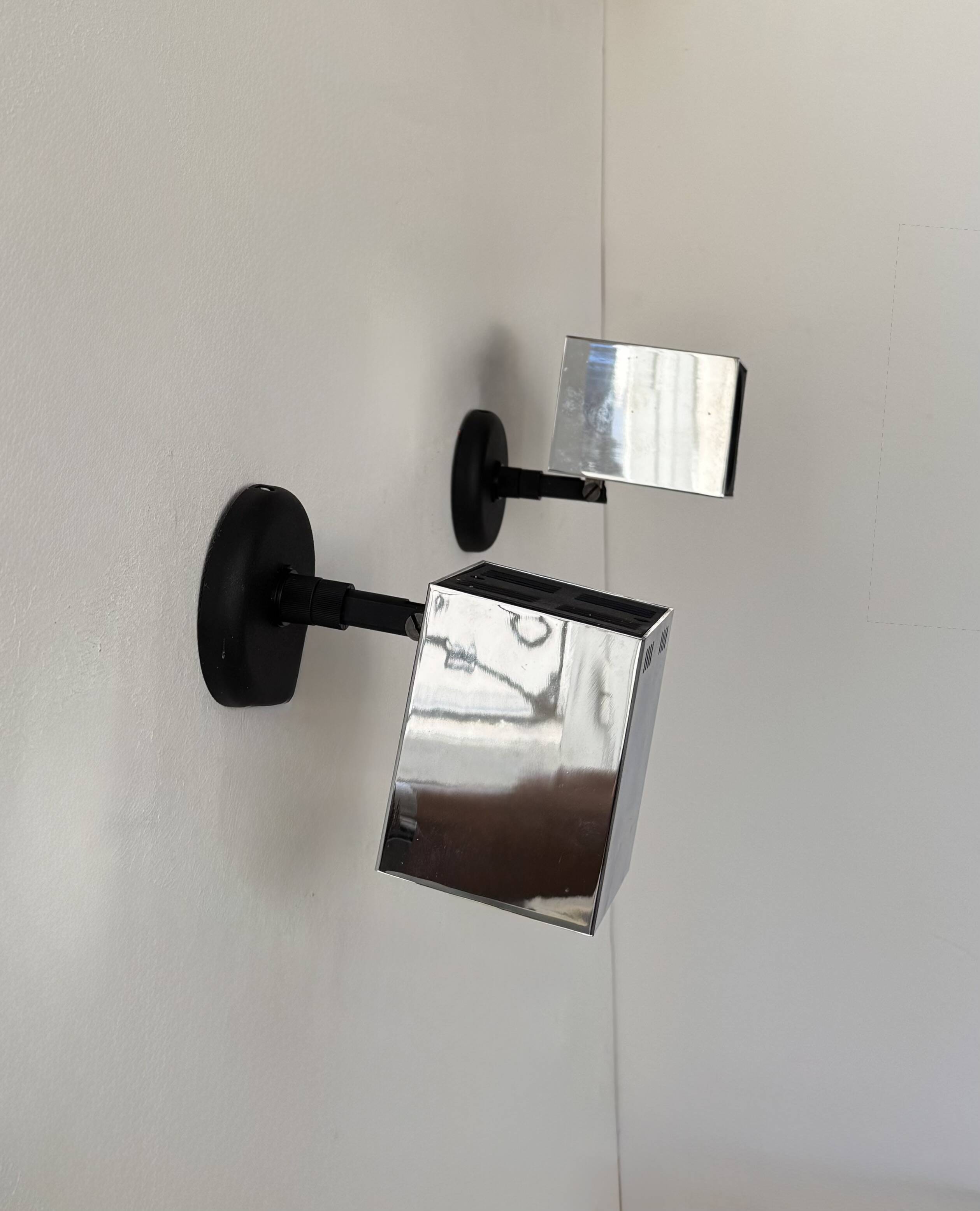 Pair of vintage adjustable wall lights, chrome-plated metal, France, 1970