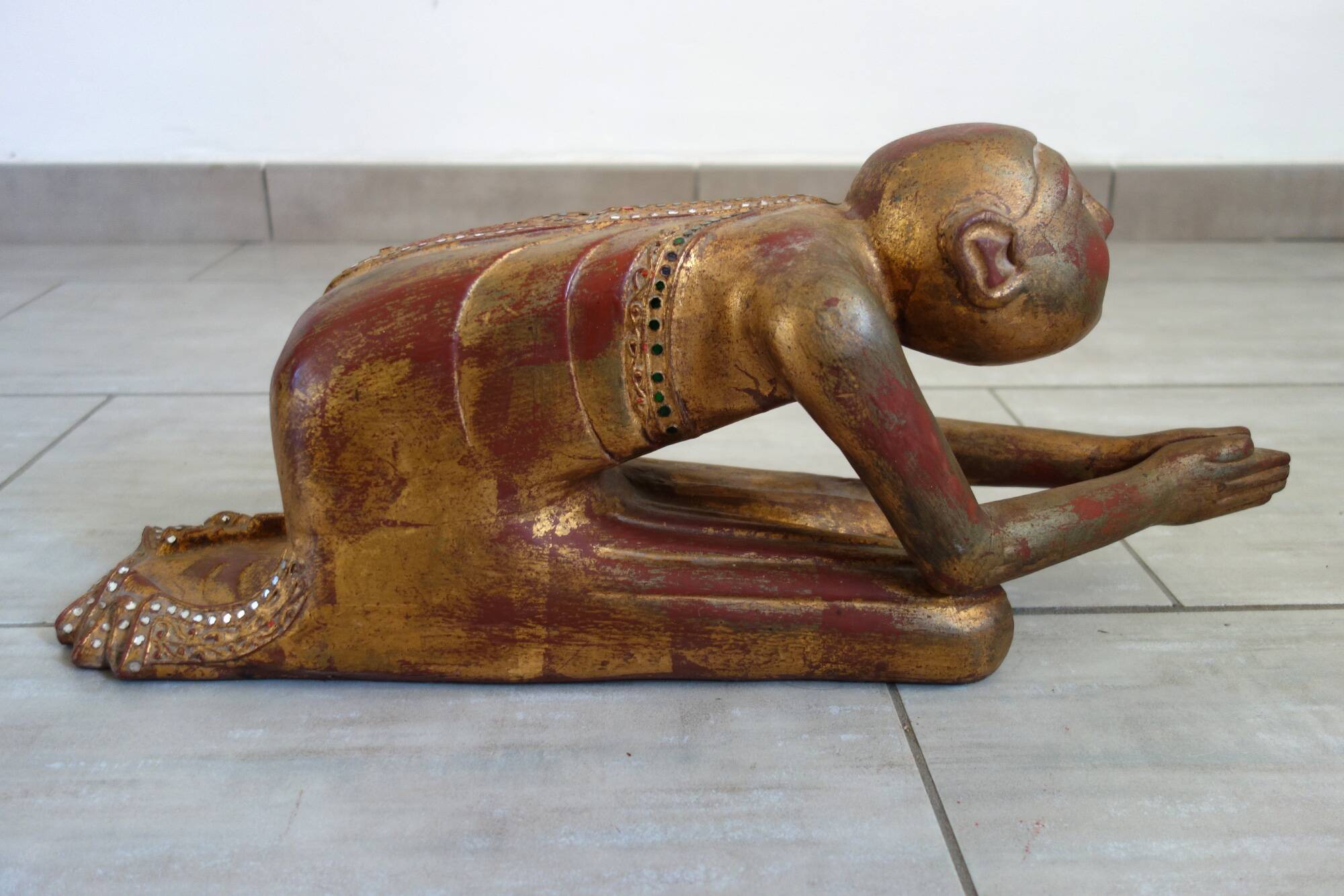 Burmese Buddhist monk statue in prayer, 19th century.