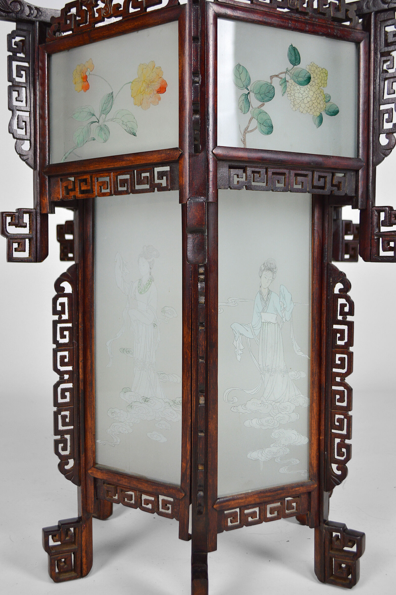 Asian wooden lantern carved with dragons and painted glass panels