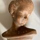 Child's head in terracotta 1920 wooden base