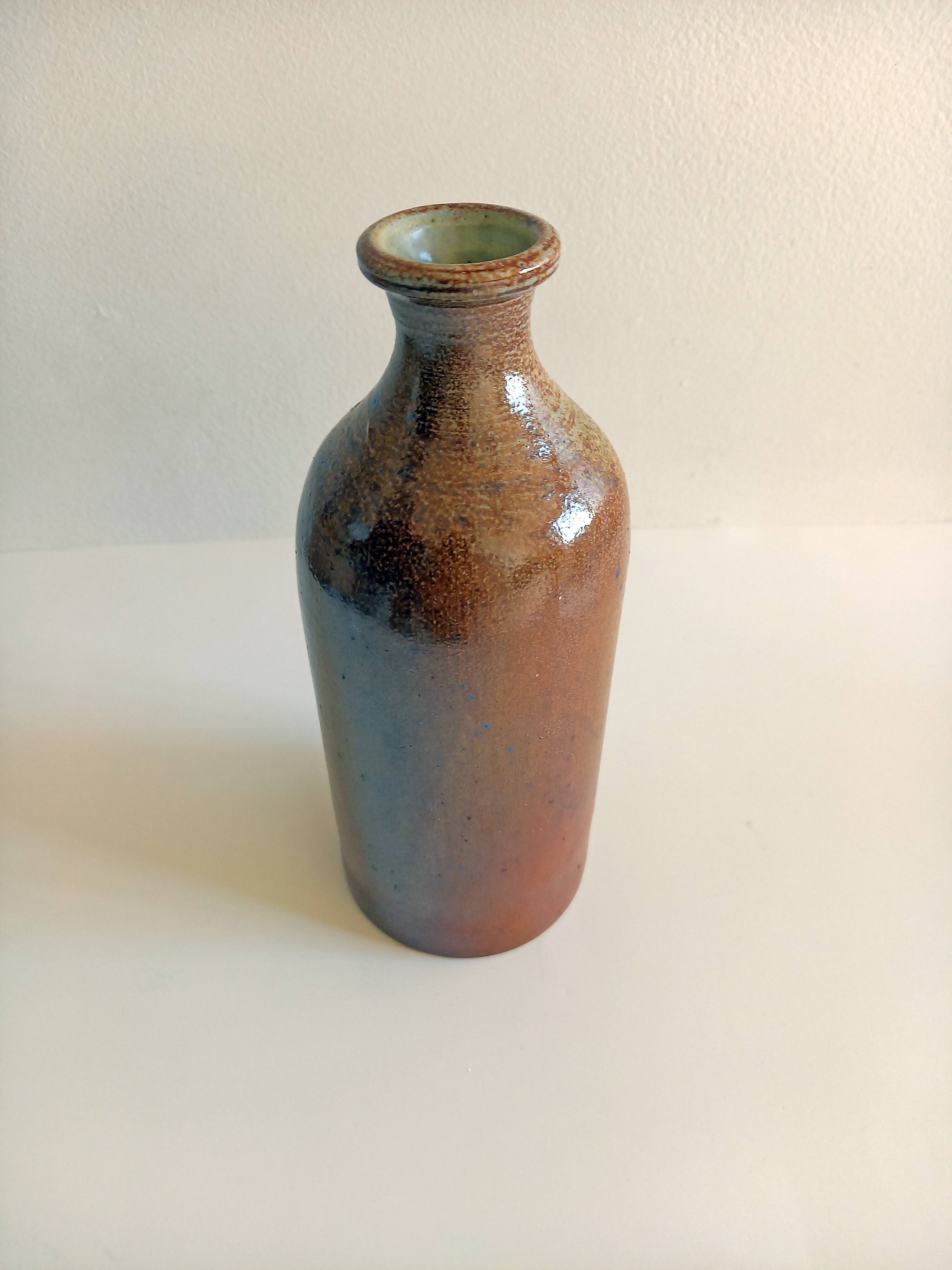 Old vase soliflore in glazed sandstone vintage