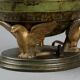 Art Deco table lamp in patinated bronze with eagles holding a globe, France 1940.