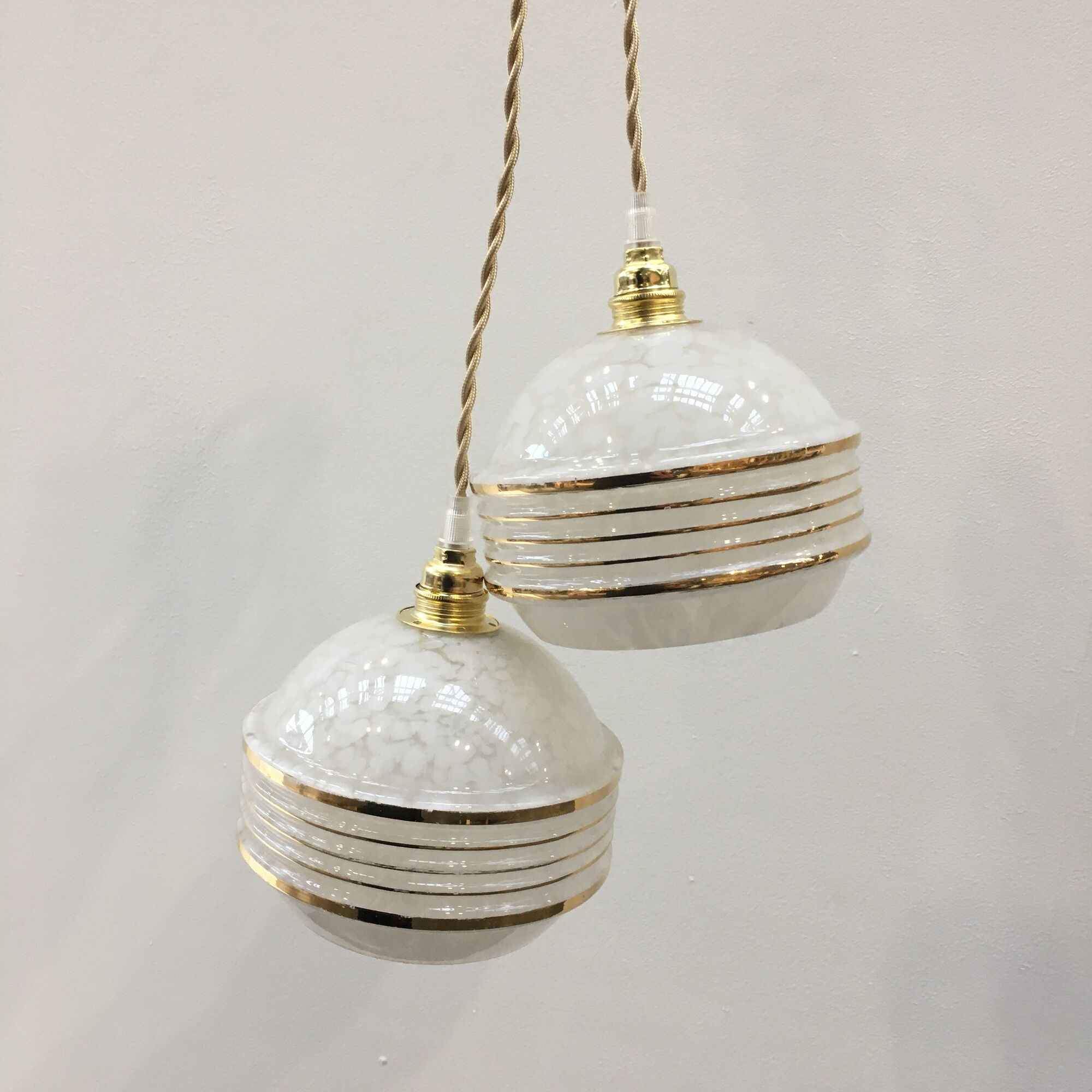 Pair of Art Deco ball suspensions in white Clichy glass