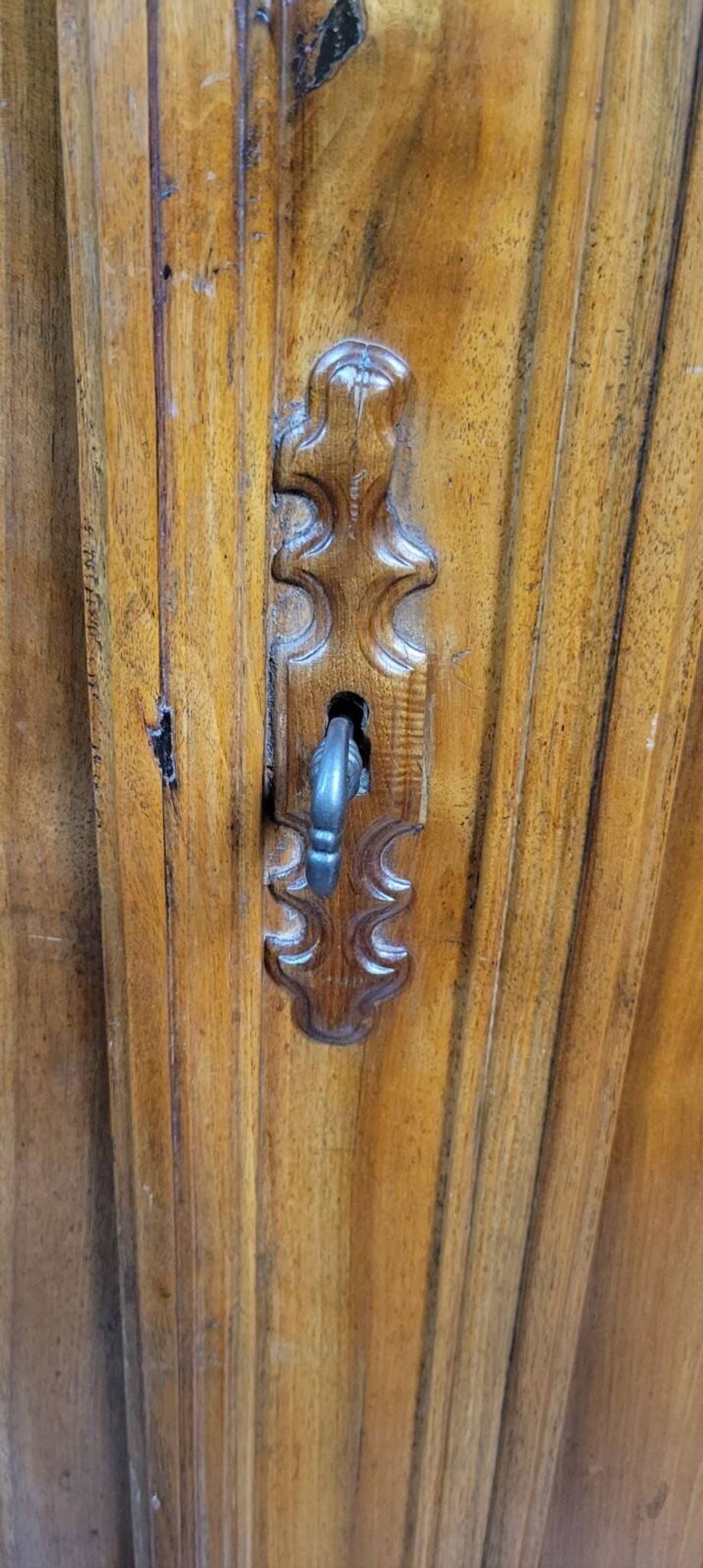 Empire period wardrobe, made of solid walnut, dating from the early 19th century.