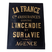 Ancienne plaque publicitaire