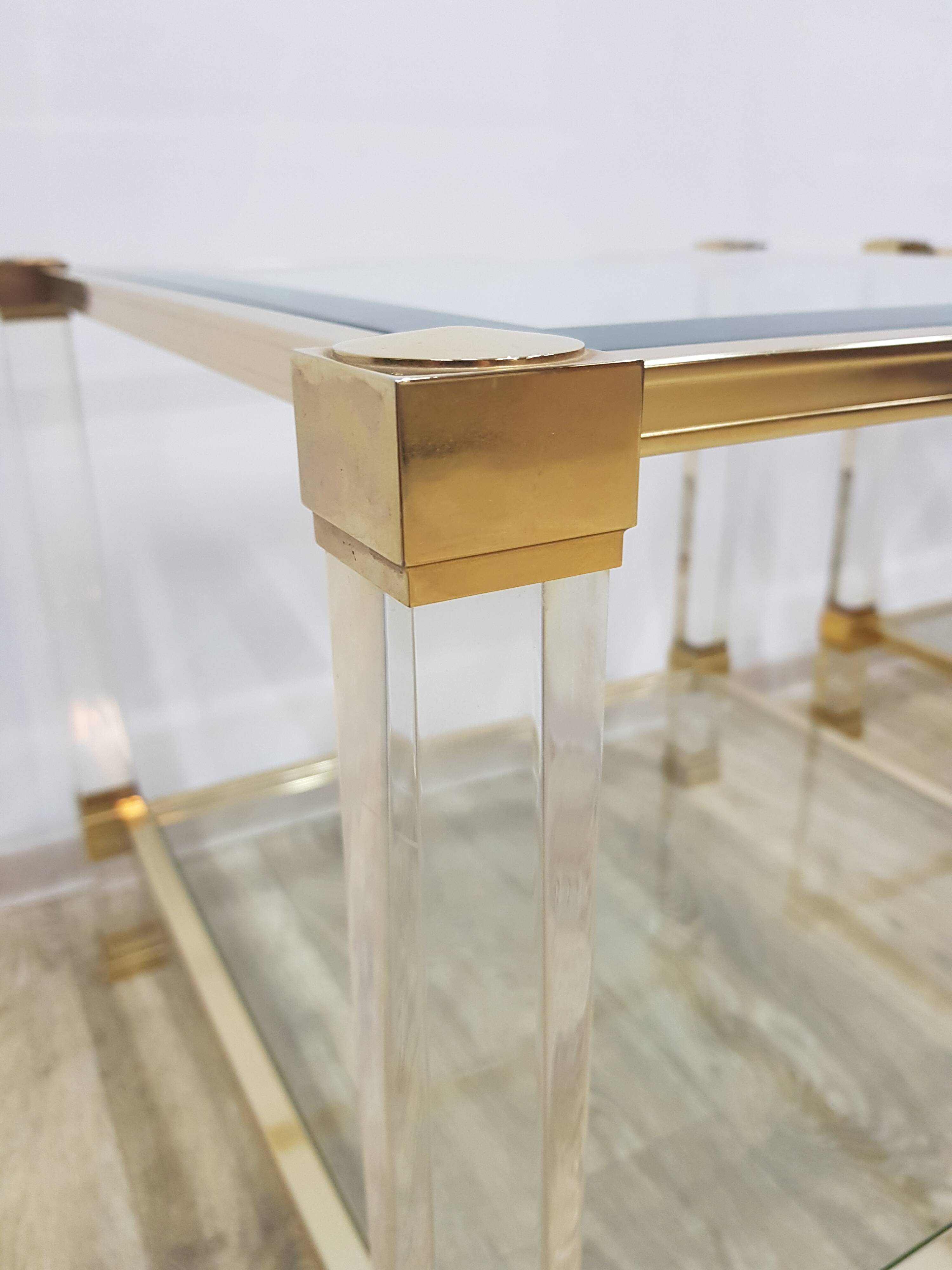 A pair of Hollywood Regency tables, designed by P. Vandel, Paris, 1970s.