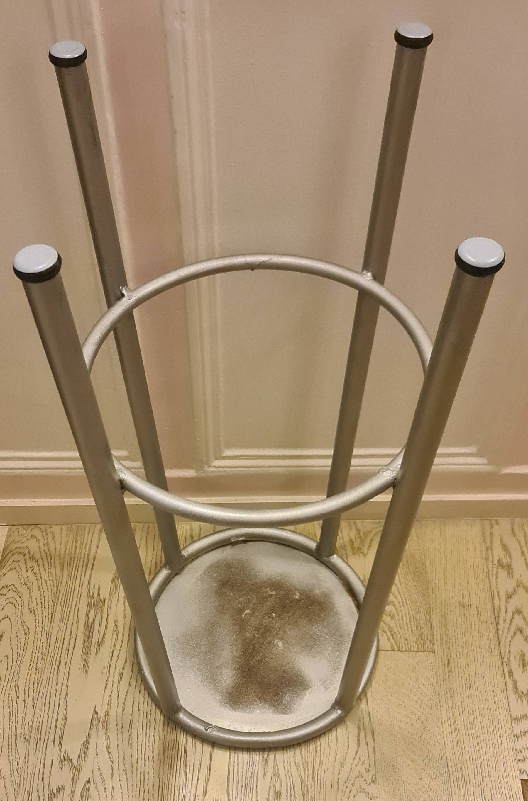 Old industrial iron stool repainted metallic gray in perfect condition