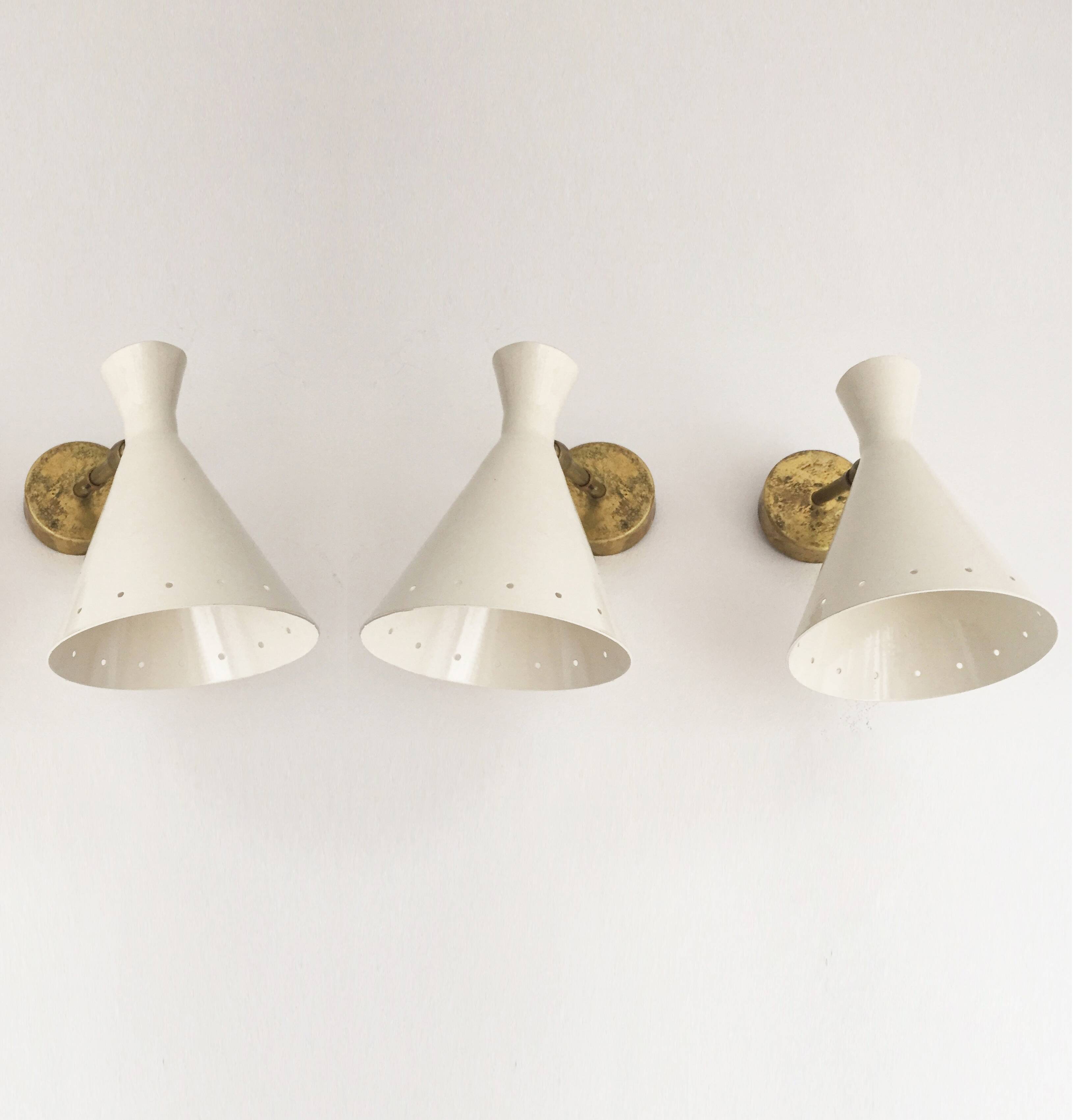 Set of three Italian wall lights in brass and lacquered iron, 1950s design