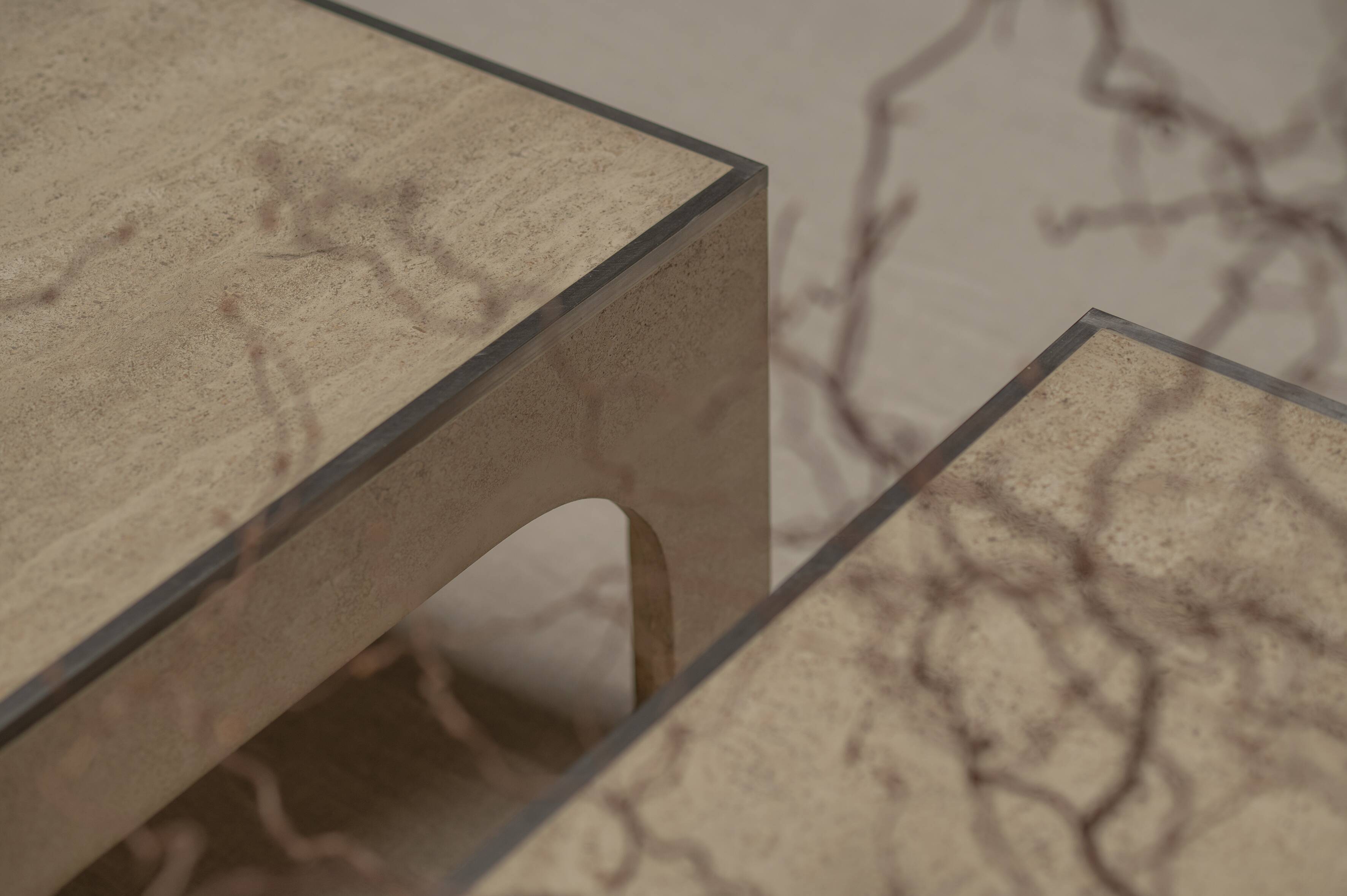 Architectural set of travertine coffee tables