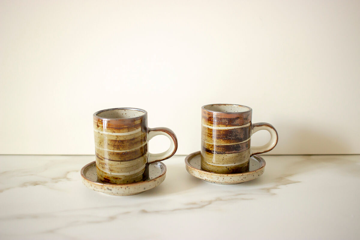 Pair of stoneware cups and sub-cups