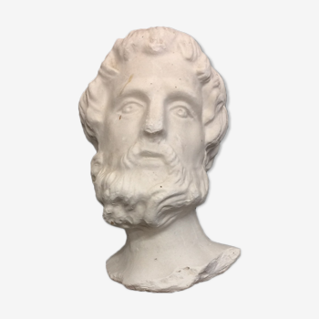 Decorative head in plaster