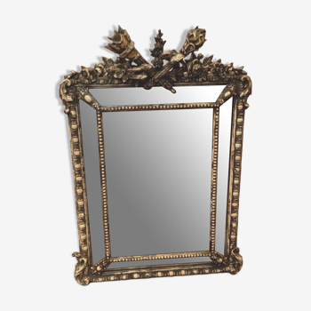 Louis XVI style mirror in wood and patinated stucco XIX century