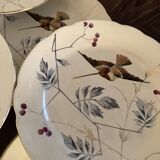 13 decorative plates with hummingbird design in fine earthenware by Mouzin Lecat, 19th century.