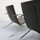 Fauteuil lounge Arco de Paul Tuttle à Strässle