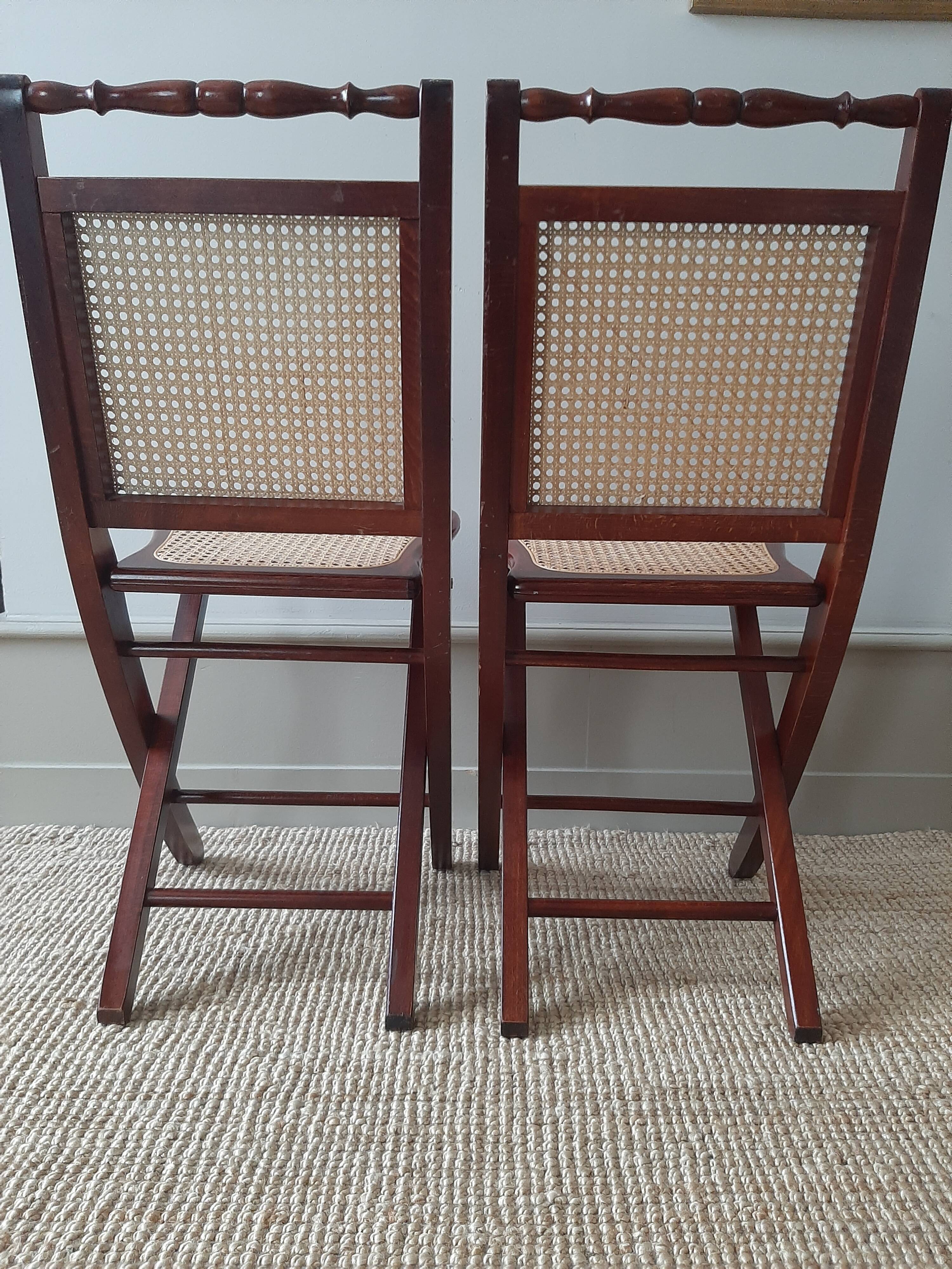 Folding wooden chairs and cannage