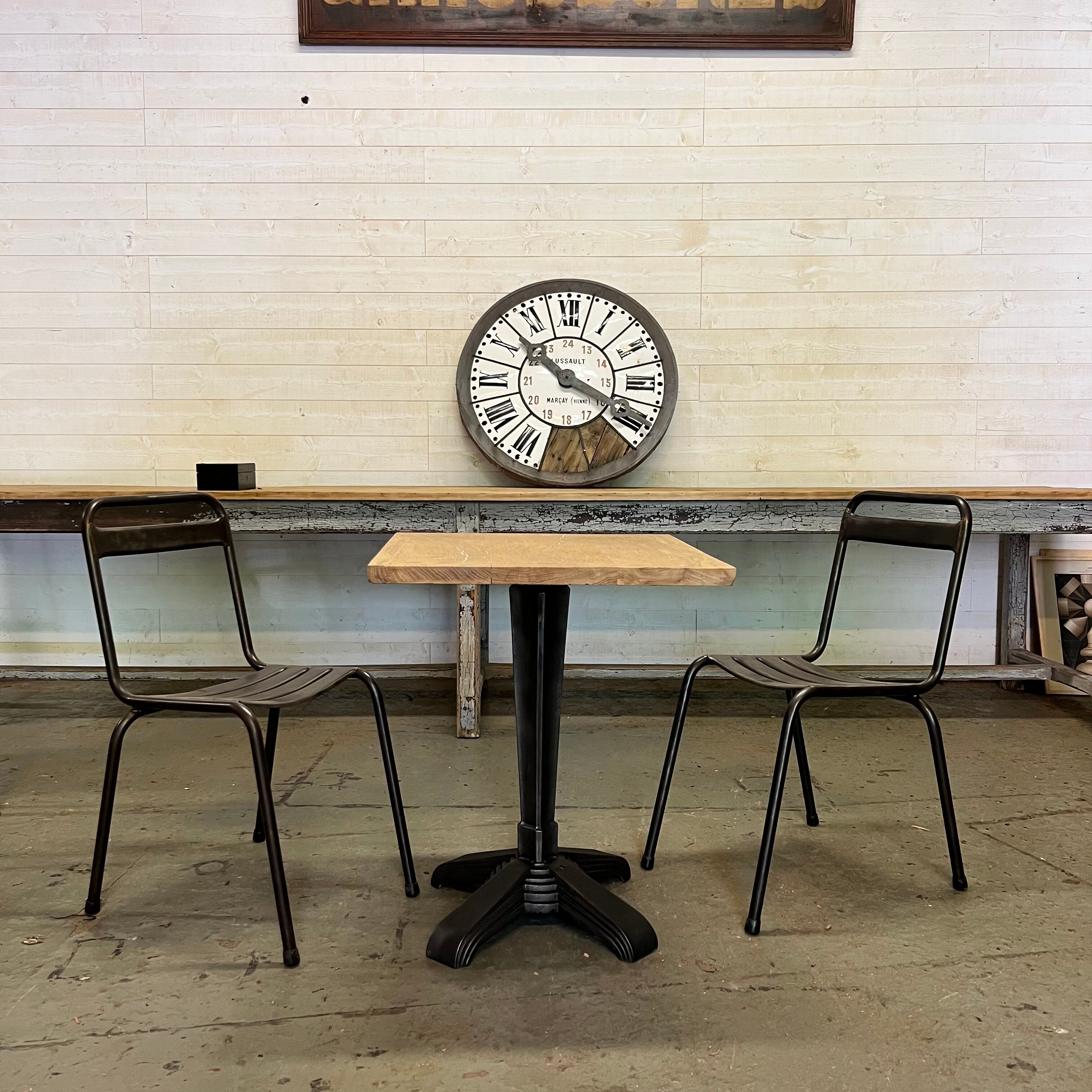 Old cast iron pedestal table brand LV