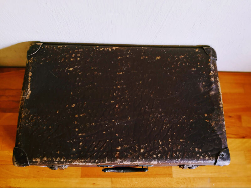 Chocolate vintage cardboard suitcase