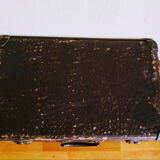 Chocolate vintage cardboard suitcase