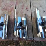 Four 70s chrome wall light