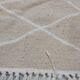 Hand-made beige and white wool rug 65x144cm