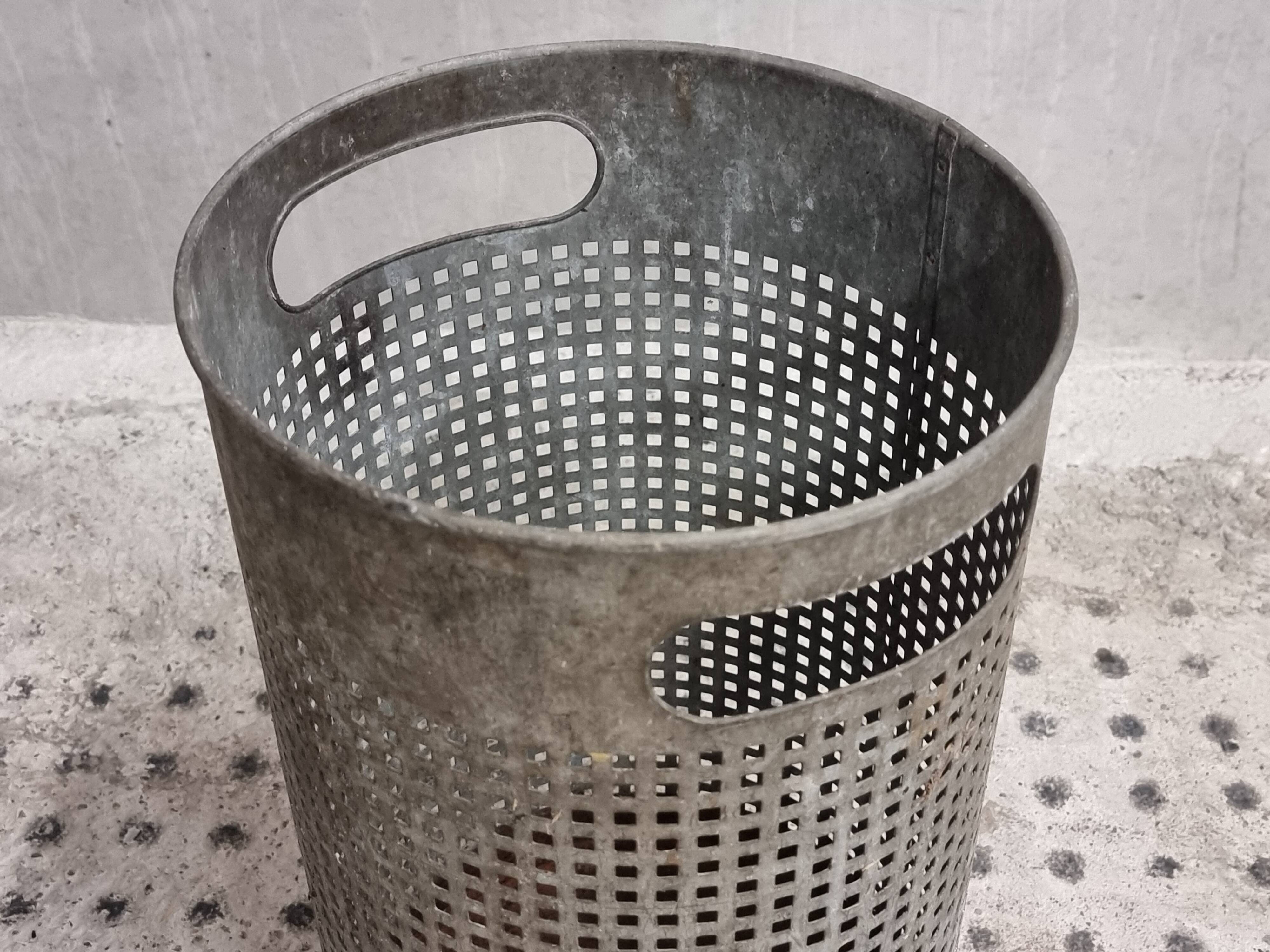 Vintage set of perforated metal waste bins