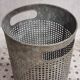 Vintage set of perforated metal waste bins