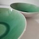 Two celadon crackle effect deep plates