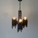 Three-armed suspended lamp in wrought iron, brutalist design, 1960s, Italy.