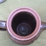 Teapot and ceramic cup signed JP