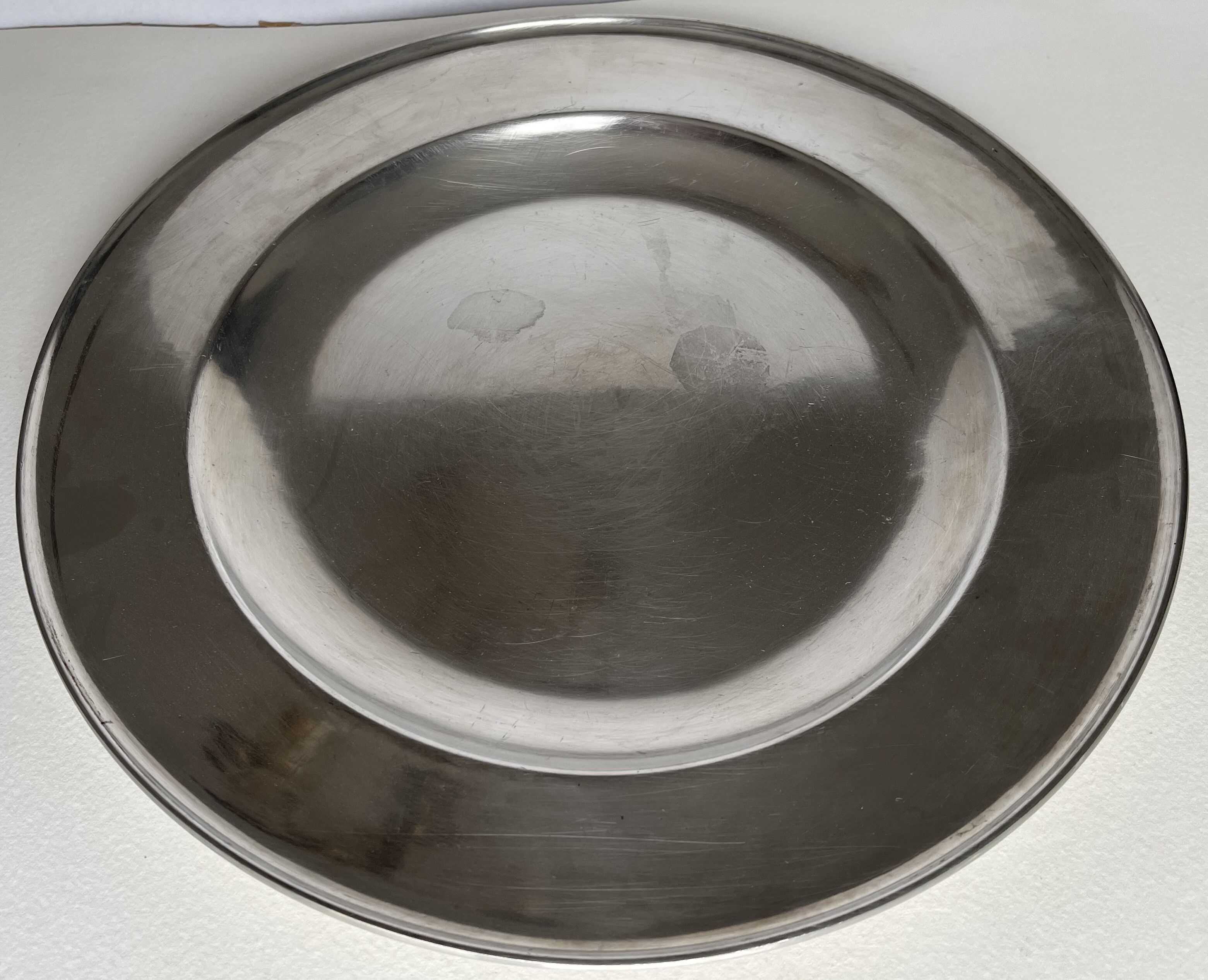 Circular pewter dish