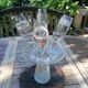 Set of 4 painted blown glass champagne flutes. Signed Denis.