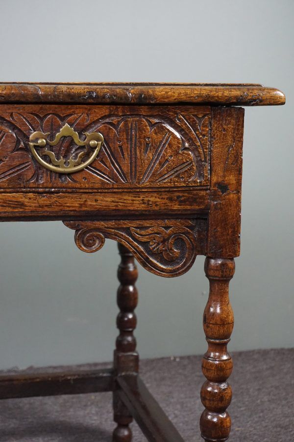 Carved antique English side table